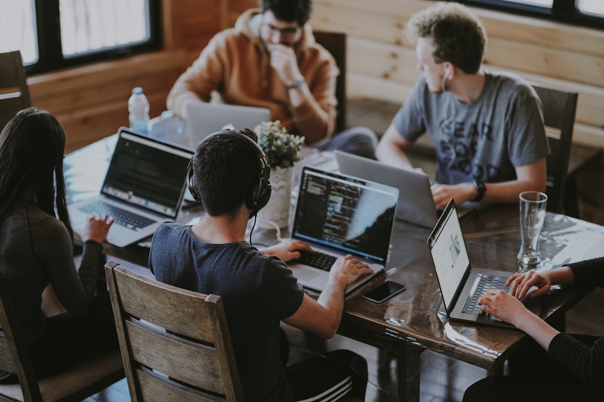 Grelixir team collaborating on software projects